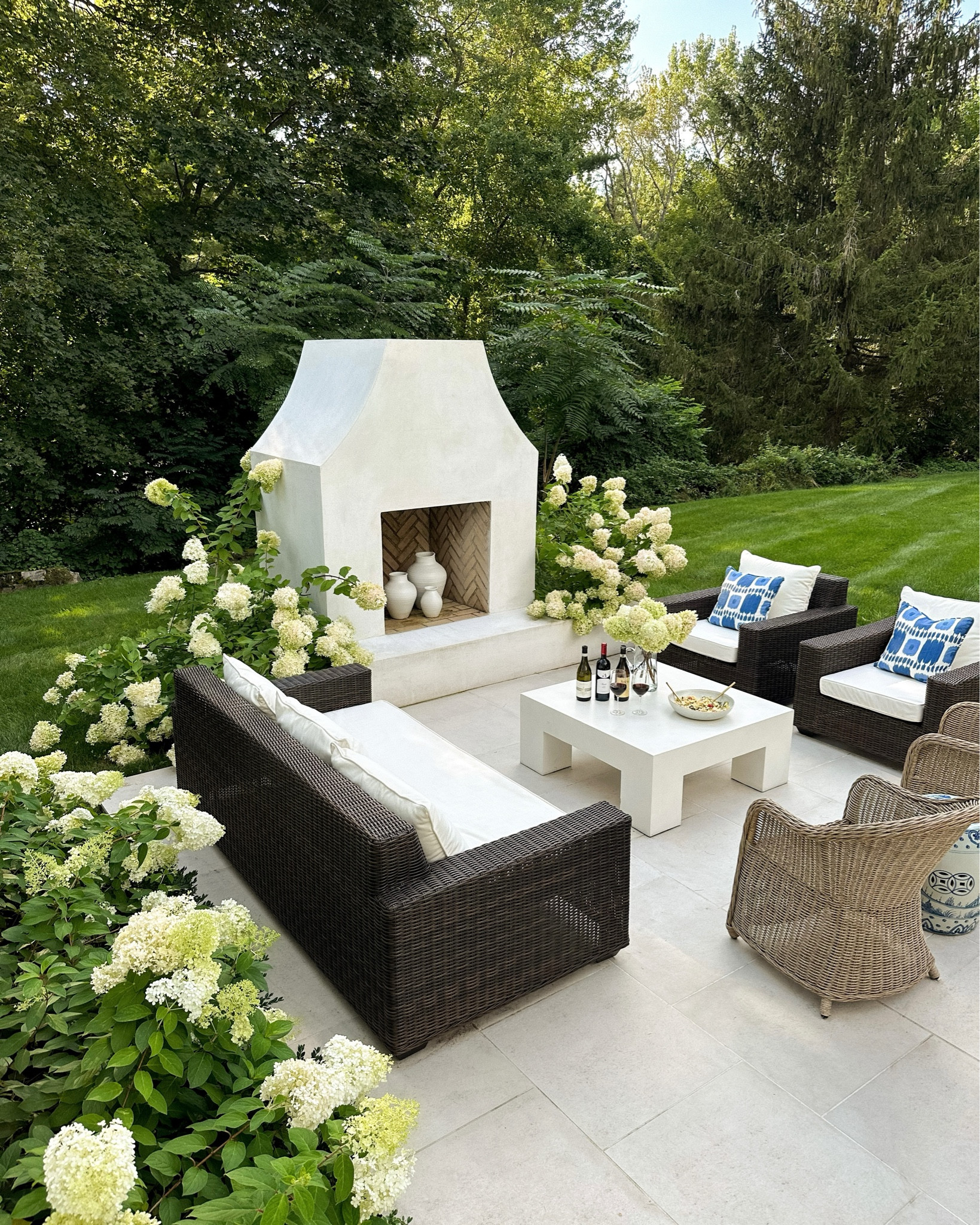Kat Jamieson shares her outdoor patio. Outdoor furniture, decor, home, interiors, sofa, chair, fireplace, coffee table. 

#LTKparties #LTKhome #LTKSeasonal
