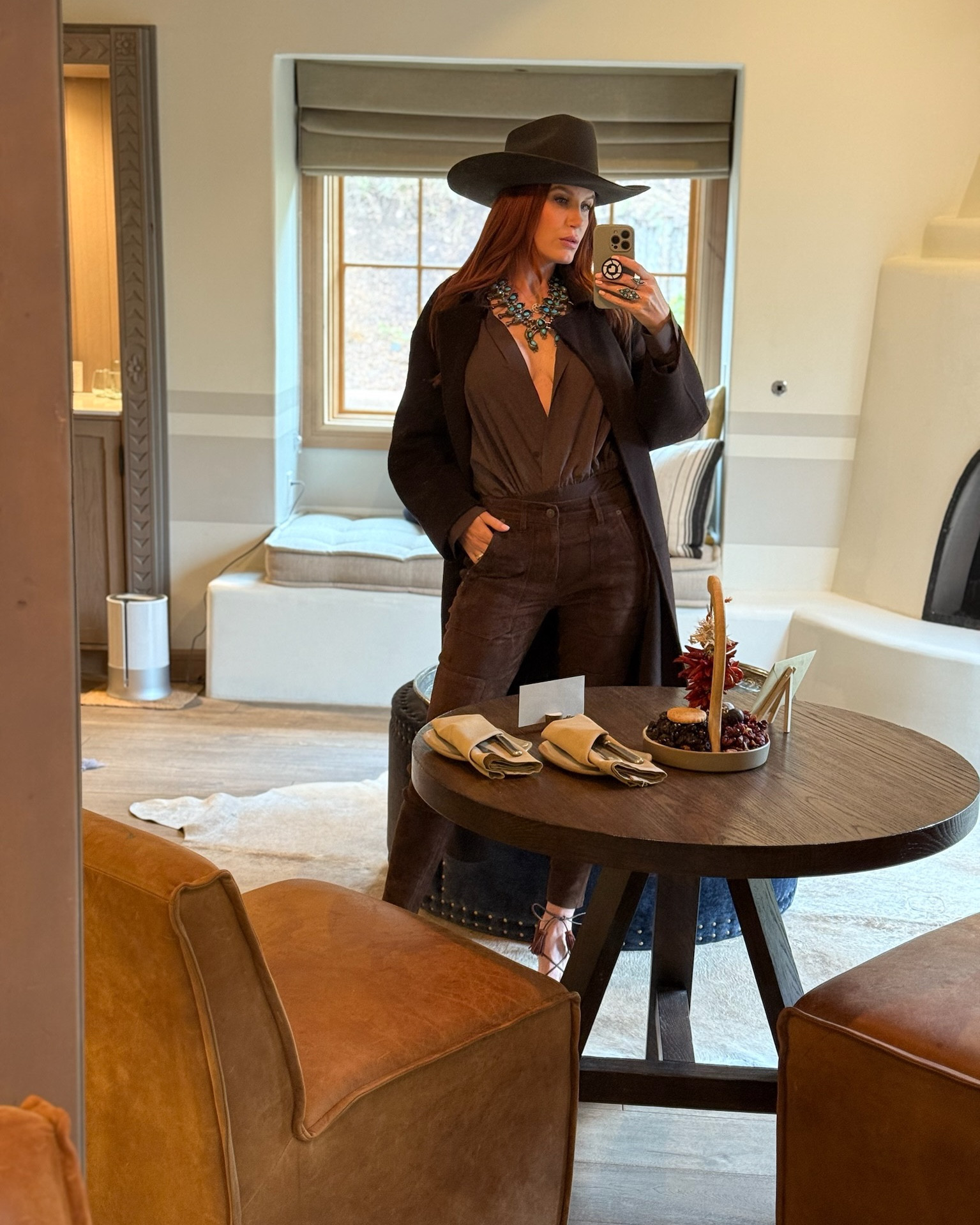 Headed to SkyFire to shoot another look at Bishop’s Lodge. I first spotted this chocolate brown top on @jourdansloane and I had to style it myself. I kept the look tonal with layered turquoise for a pop of color and topped it off with my felt hat.

Fun fact: after Easter, real cowboys switch to straw hats to mark the warmer season. But it was still chilly in Santa Fe, so I stuck with felt… and let’s be honest—I’m not a real cowboy😉

#LTKStyleTip #LTKTravel #LTKParties