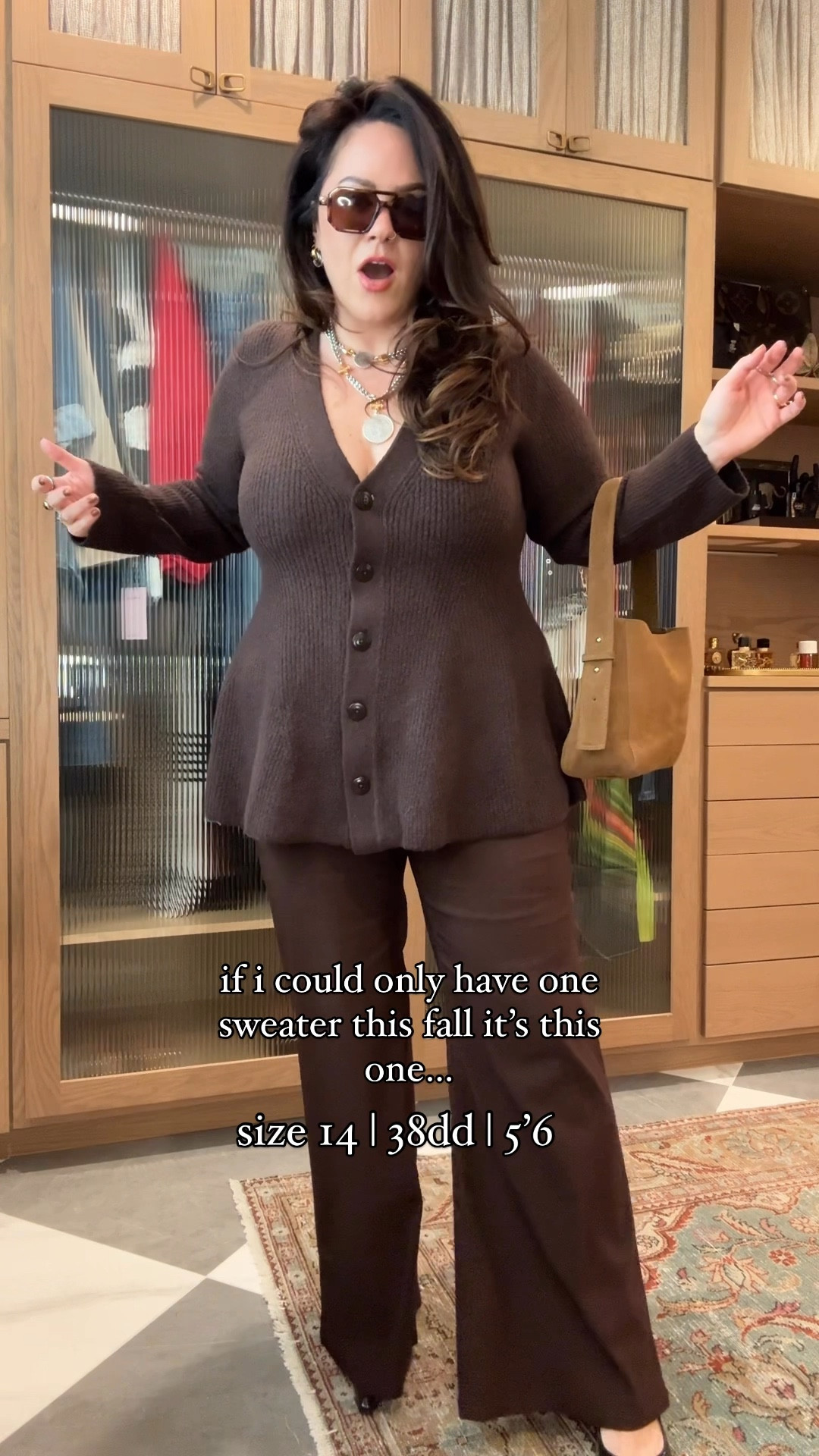 This cardigan sweater is a midsize thick tummy baddies dream! 
I got the chocolate brown but it also comes in black! Wearing an xl 

My chocolate stretchy pants I sized up in to a 34 

Midsize fall workwear outfit 

#LTKVideo #LTKWorkwear #LTKSeasonal