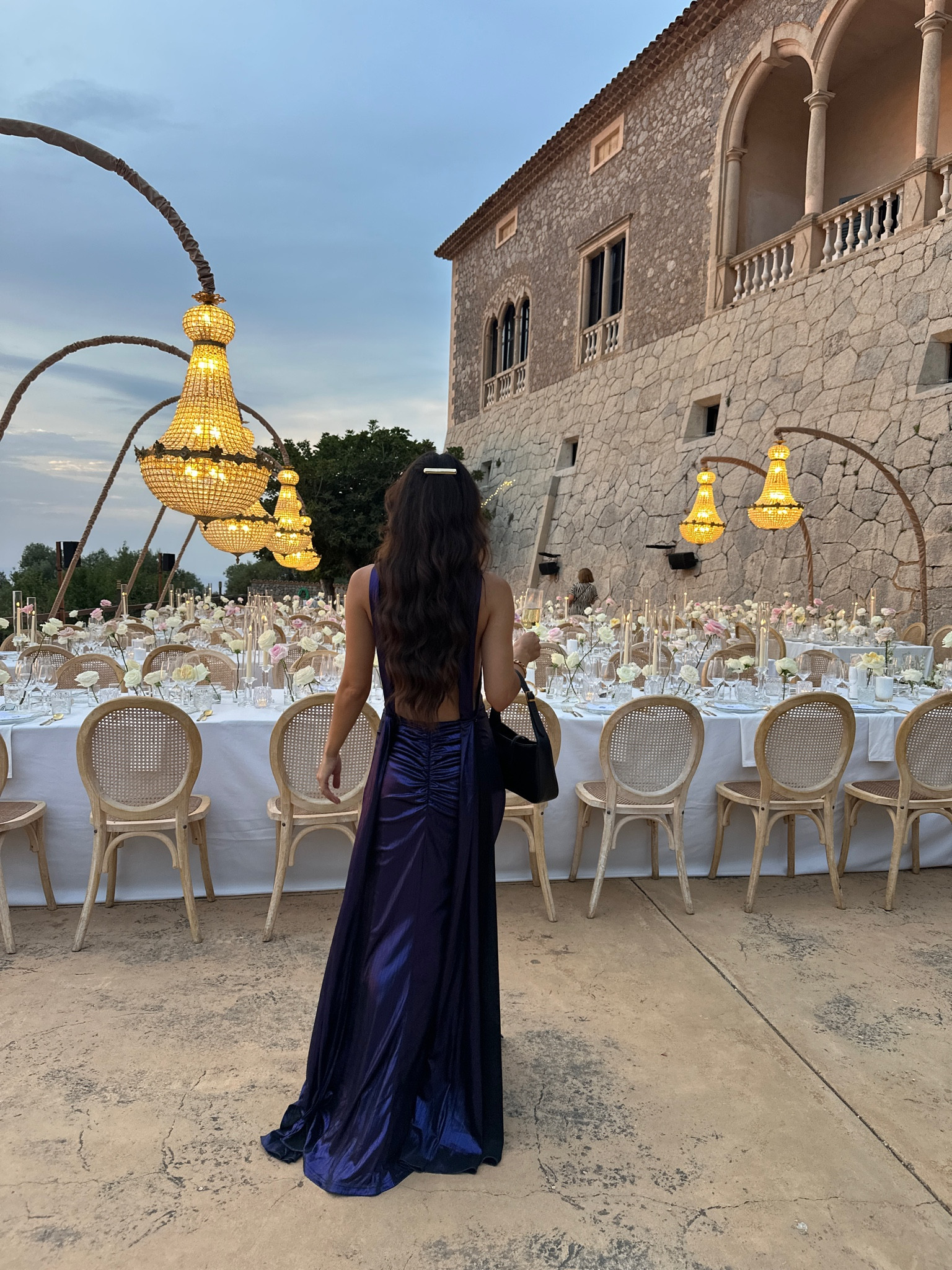 Wedding guest ready ~ adore this backless midnight metallic gown. Pair with a gold hair clip to complete your look. 

#LTKparties