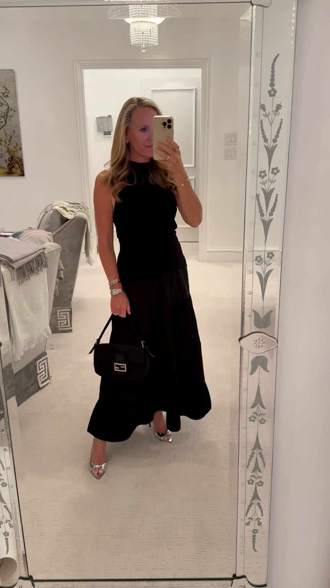 Brochu Walker multimedia dress with knit sleeveless mock turtleneck top and silk like tiered skirt 
Fits TTS 
Solver heels
Fendi baguette handbag

#LTKOver40 #LTKSeasonal #LTKootd