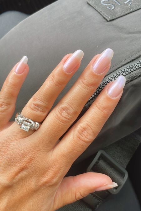 Glazed nails 
Opi- put it in neutral
Essie- iced out

Neutral mail polish, glazed donut, iridescent 

#LTKSeasonal #LTKbeauty #LTKstyletip
