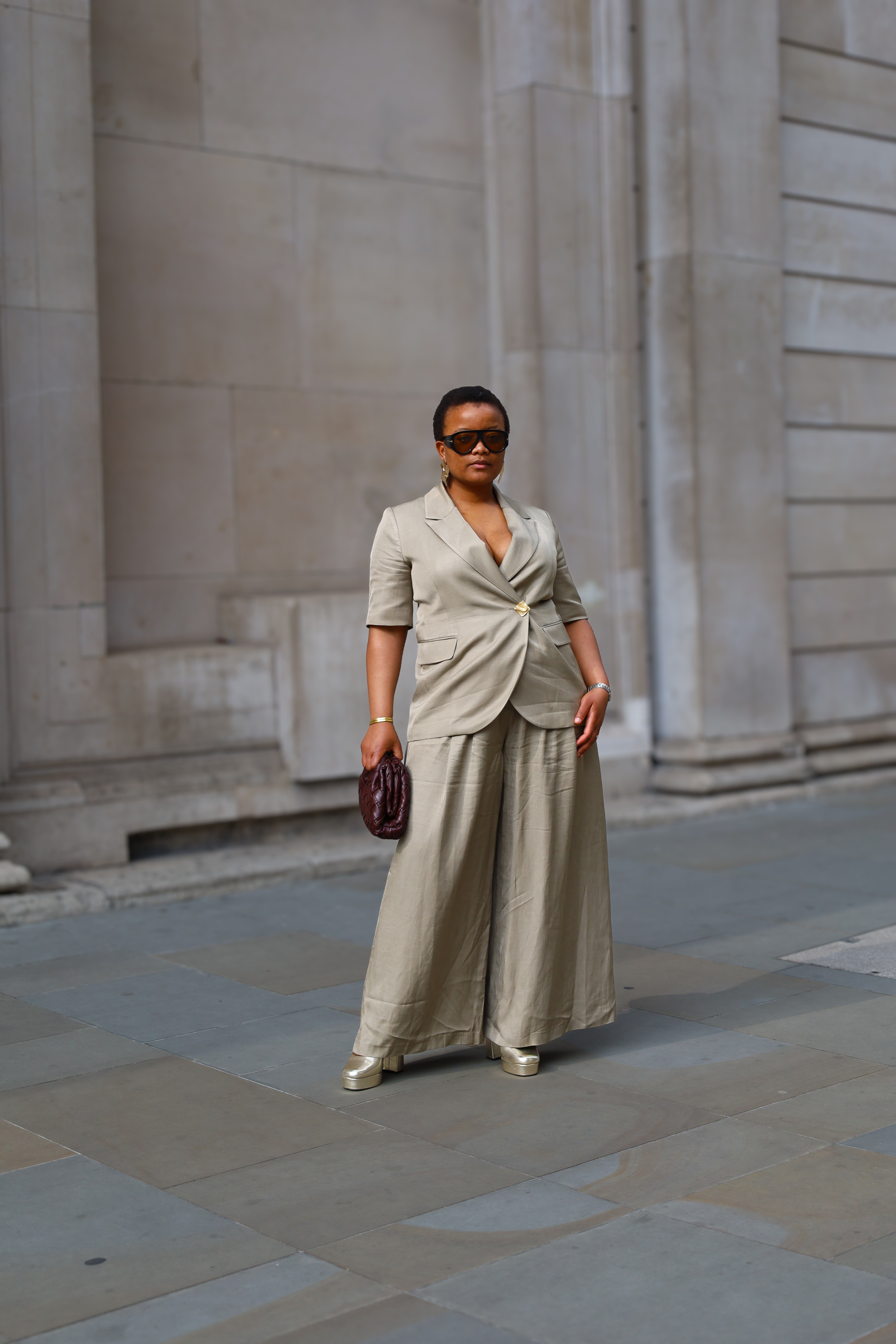 Suited in Mint Velvet short sleeve jacket with wide leg matching pants. Premium clothing in size 14 both true to size. Styled with gold platform here Asos in size 8 and woven clutch bag in burgundy and Tom Ford Retro Dupes from Amazon for less than £4. #suited #mintvelvet #taupe

#LTKspring #LTKuk #LTKstyletip