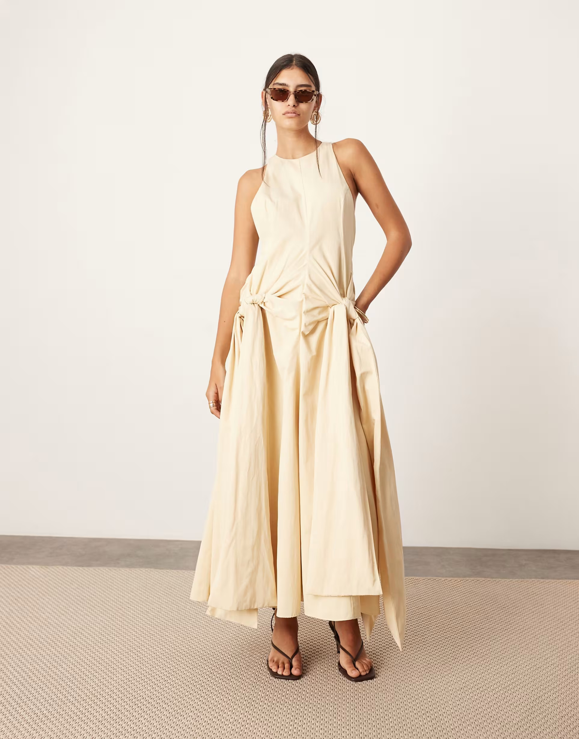 ASOS EDITION racer neck drop waist maxi dress with knot detail skirt in stone | ASOS (Global)