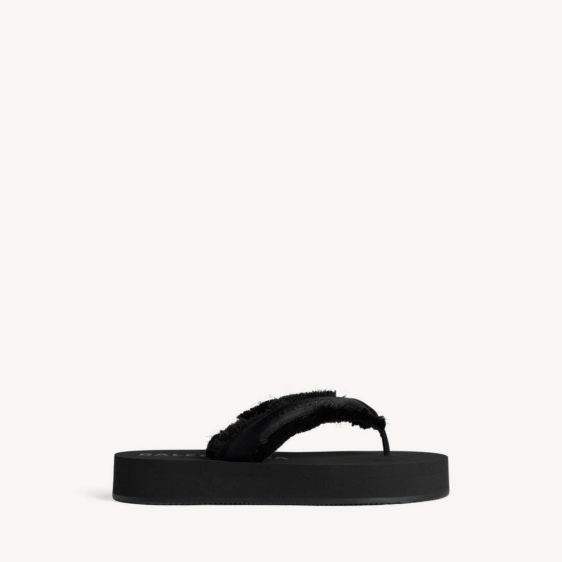 Jet Lag Thong in black brushed satin is from in several looks of Balenciaga Summer 26 Collection. | Balenciaga