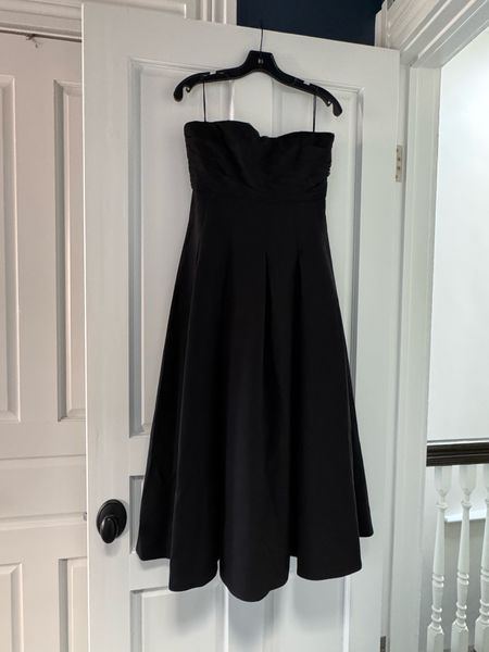 The perfect black dress for a formal function. I ordered size 6 and it fits perfectly. No need for a strapless bra. The design details and construction are made to fit perfectly. 

#LTKstyletip #LTKSeasonal #LTKover40