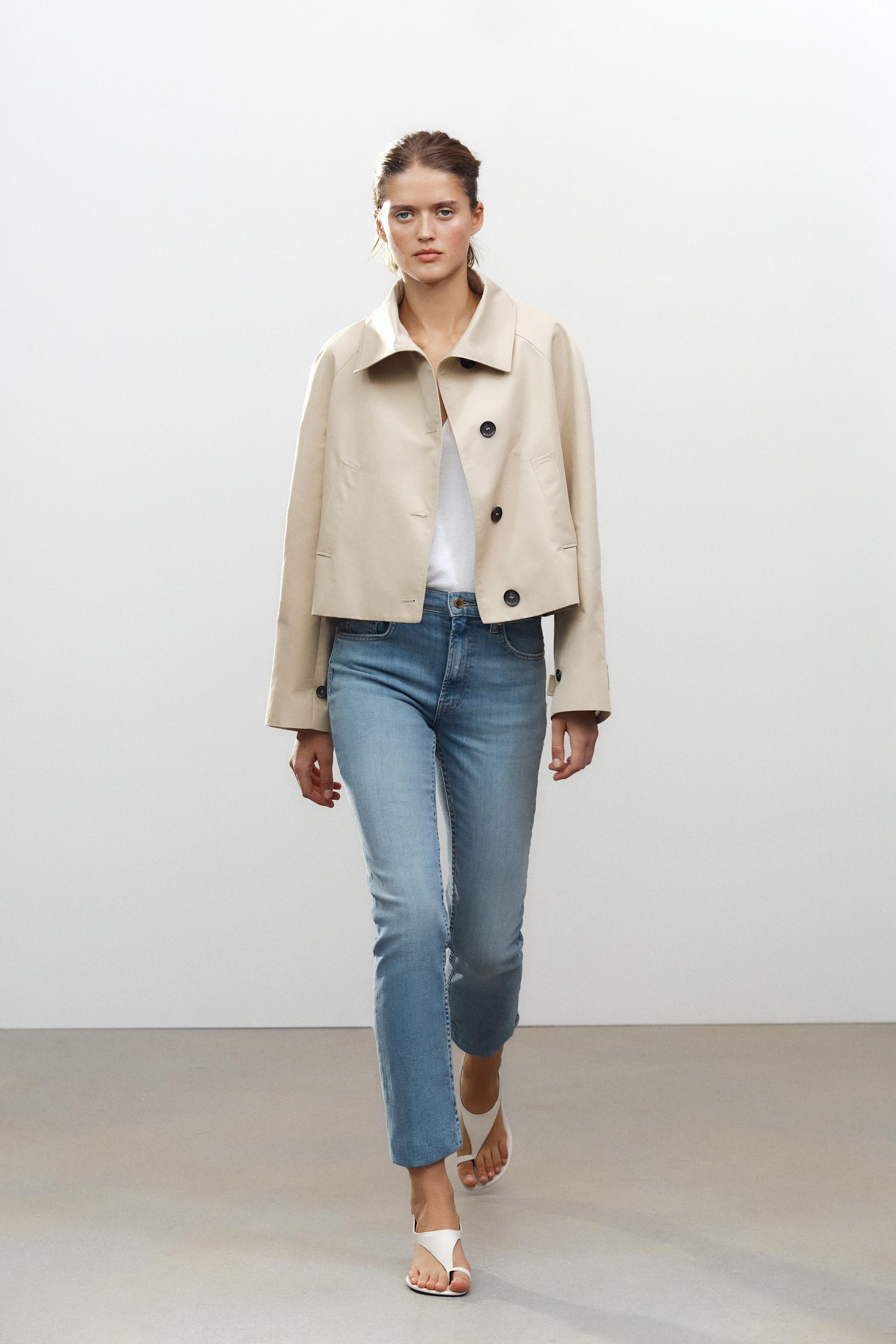 ZARA WOMAN COLLECTIONTrench coat made of a cotton blend yarn. Lapel collar and adjustable long sl... | Zara US