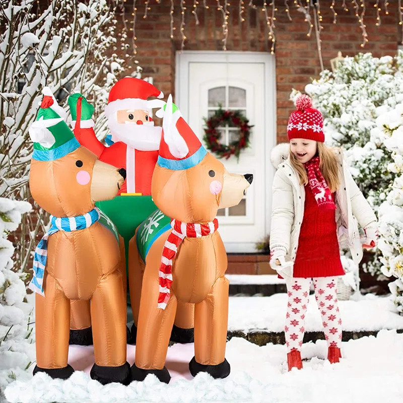 The Holiday Aisle® Emila Christmas Inflatable Santa on Sleigh with Reindeers and Gift Boxes & Re... | Wayfair North America