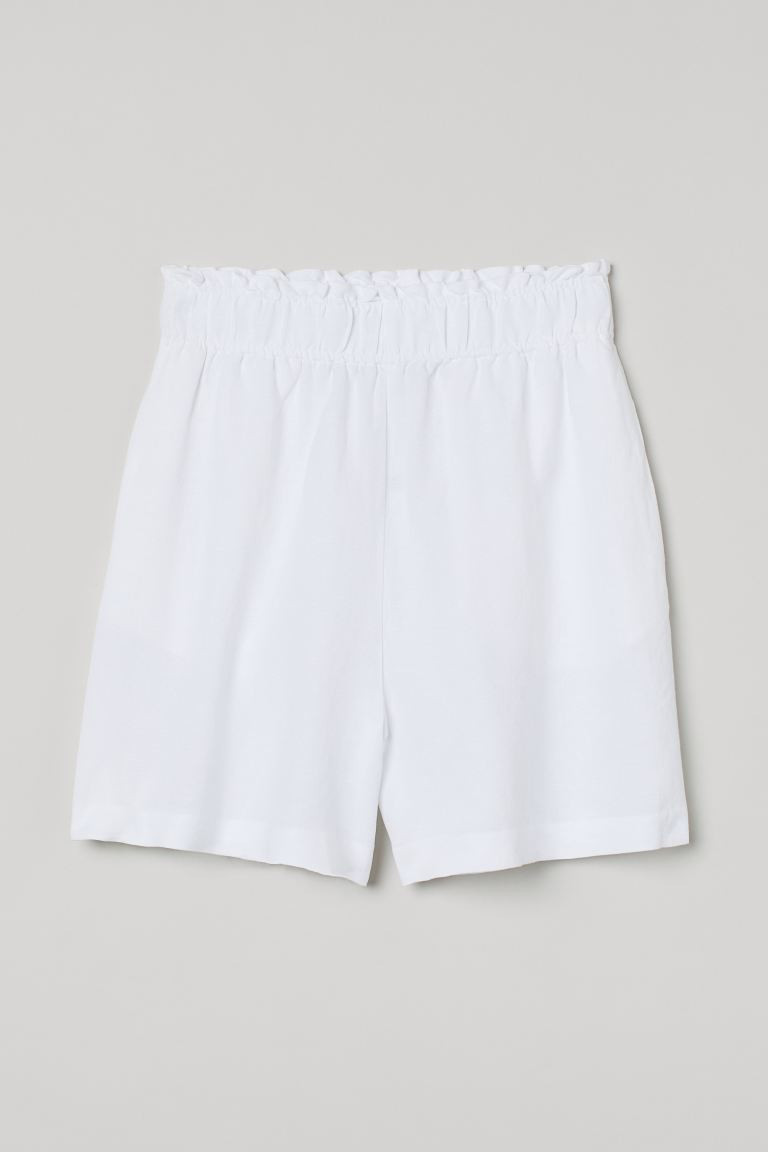Shorts in a linen and viscose weave. High waist with covered elastication and a small frill trim,... | H&M (UK, MY, IN, SG, PH, TW, HK)