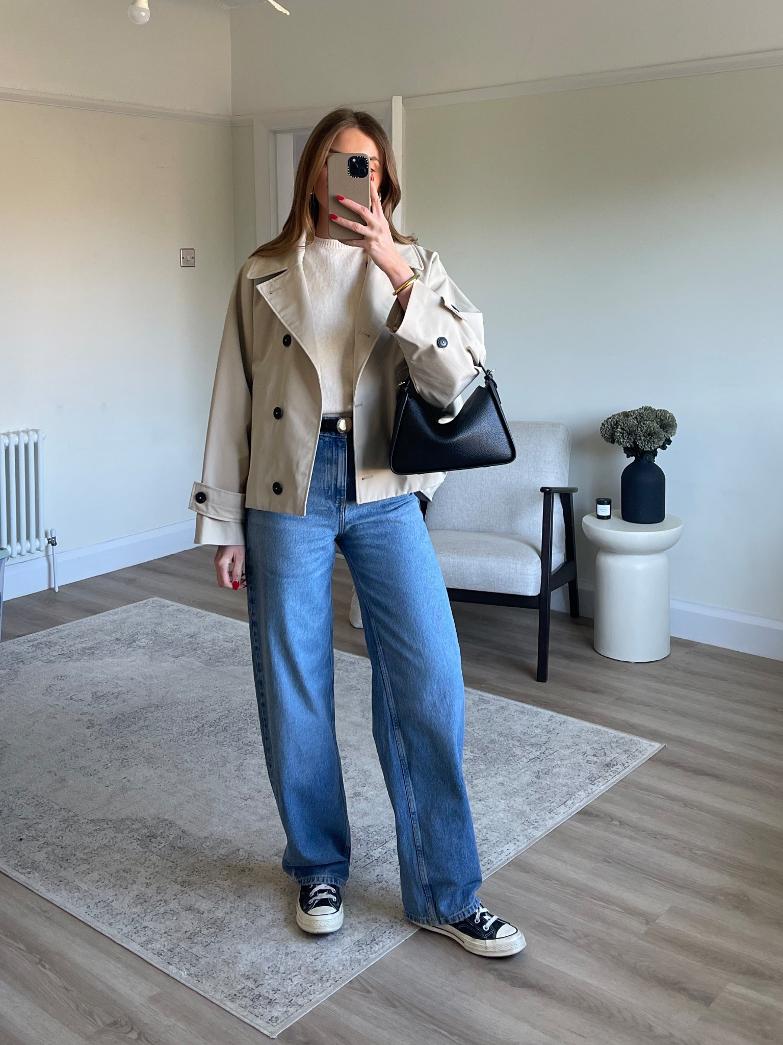 Short trench coat styling 
Small in the jacket
Medium in the cream knitted tshirt
6 in the Zara jeans 
The horse bag
Converse 

#LTKuk #LTKspring