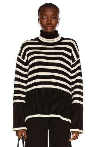 Toteme Signature Stripe Turtleneck Sweater in Black Stripe - Black. Size XS (also in L, M, S). | FWRD 