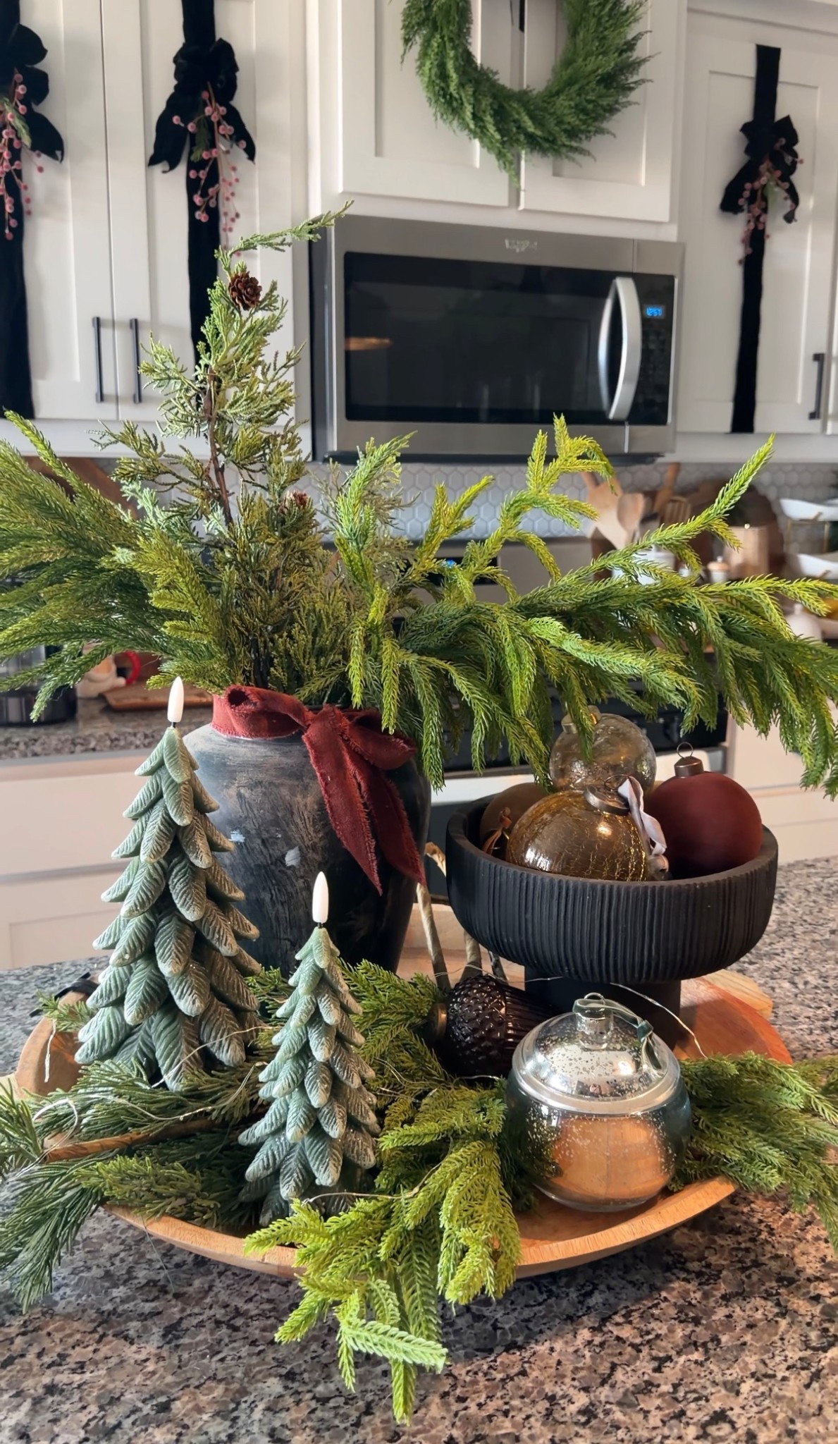 Christmas kitchen arrangement, holiday tray styling , Christmas greenery , organic holiday vibes 

#LTKHome #LTKHoliday #LTKSeasonal