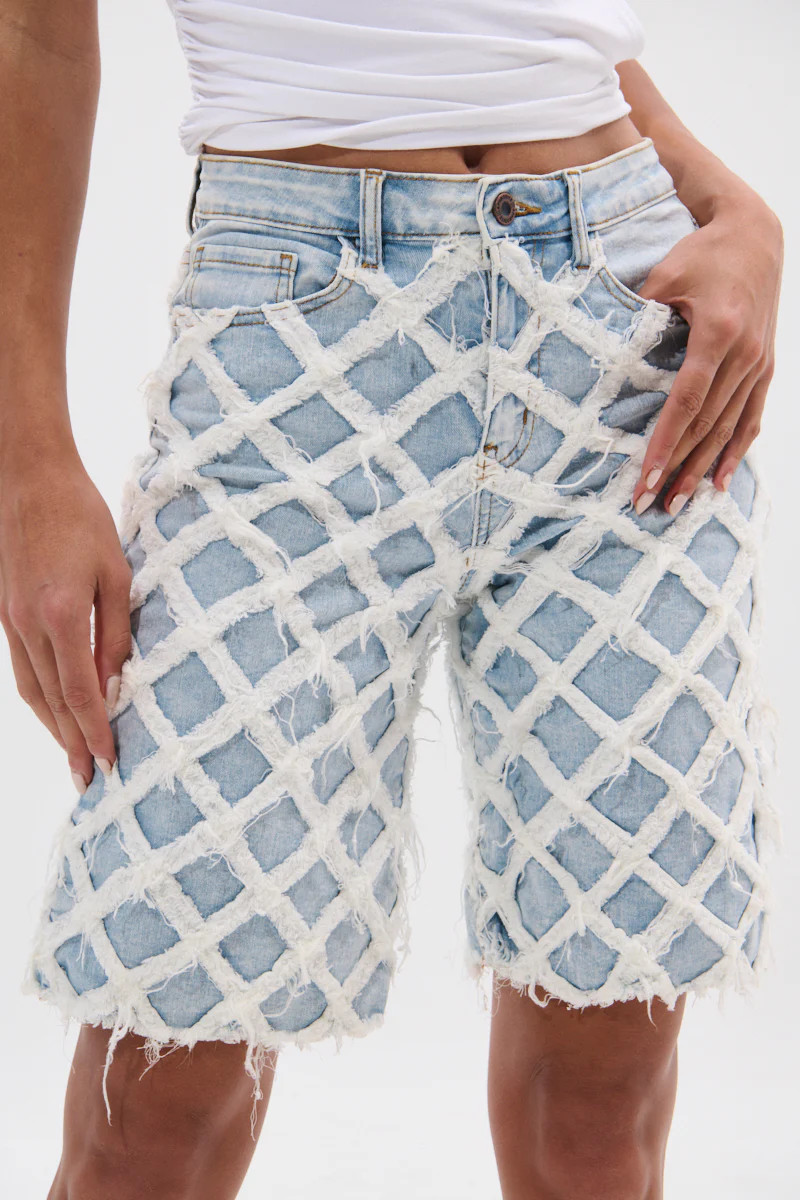 DISTRESSED AND STRESSED DENIM BERMUDA SHORT | AKIRA