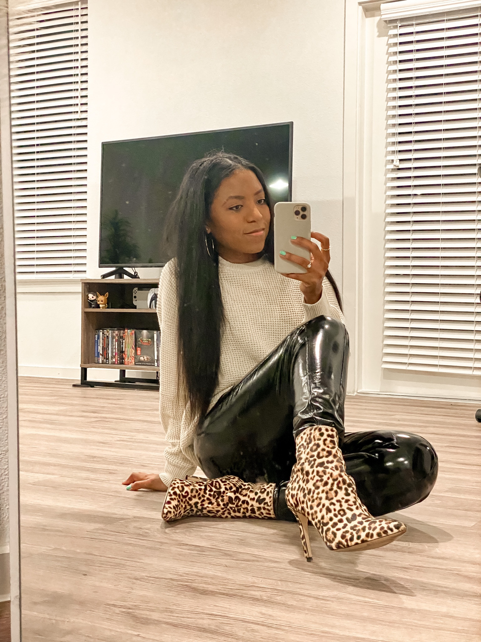 Chunky oversized sweater from Aritzia and Spanx faux leather leggings outfit for work today! Paired with leopard print booties to add a fun pattern to the look. 

#LTKFind #LTKworkwear #LTKshoecrush