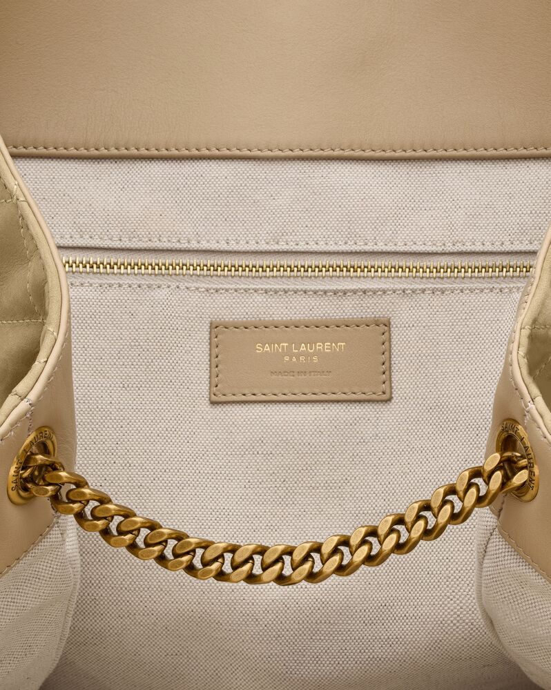 MAXI NUBUCK SUEDE TOTE WITH AN OVERSIZED CASSANDRE YSL EMBELLISHMENT.ITS SMALL INNER CHAIN CAN BE... | Saint Laurent Inc. (Global)