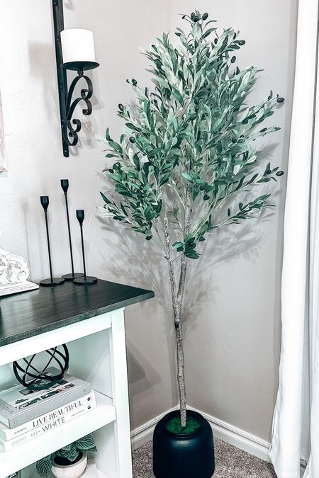Faux olive tree from Amazon!
My guest room was looking empty once Christmas came down- this little beauty filled the spot nicely!

#LTKhome #LTKFind #LTKunder100