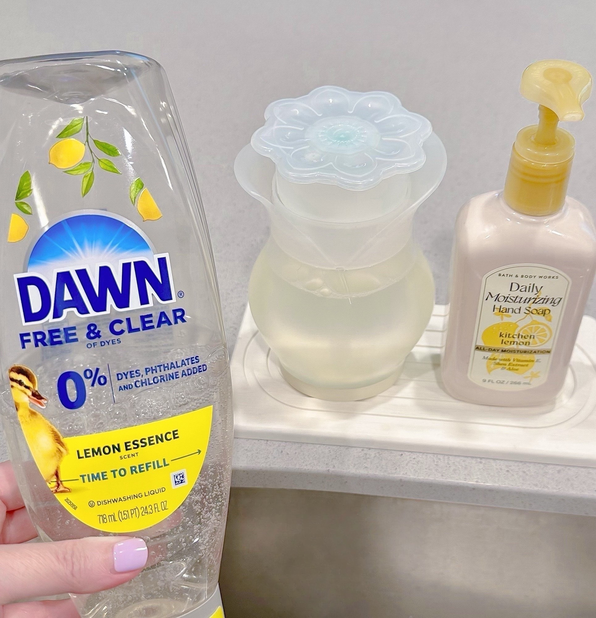 Taking Lemons right into Fall! This little flower dish soap holder make me so happy! Can push down on the top or squeeze to come out of the bottom. 

Filled it Dawn Free & Clear Lemon Essence to pair with Bath & Body Works Kitchen Lemon Hand Soap. This new moisturizing soap leaves hands incredibly soft! 

Of course it all needed a water absorbing stone to rest on. Actually comes in a set of 2! 

Home Decor. Kitchen Accessories. New Home

#LTKHome #LTKSeasonal #LTKdayinmylife