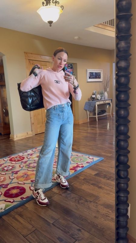 Still absolutely loving these free people jeans! The adjustable waist is amazing for days when your body is fluctuating. I love that the bottoms roll up and stay rolled but can also roll down for higher shoes. I bought the Lala land wash. Wearing size 25. Chanel sweater was thrifted. Also wearing my Chanel sneakers and Prada bag. 

#LTKover40 #LTKstyletip #LTKVideo