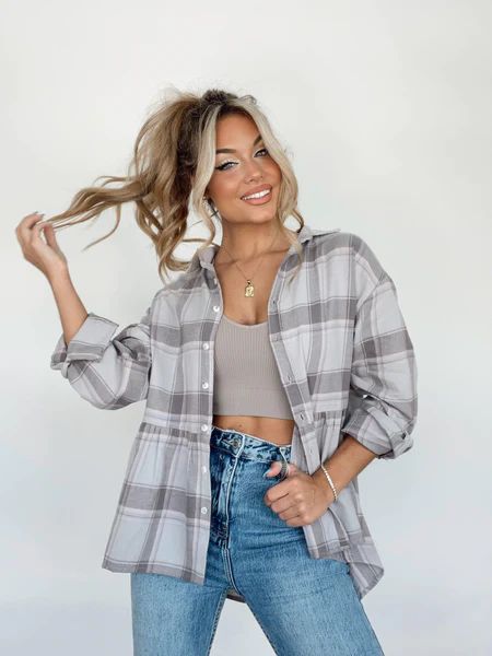 Anywhere With You Plaid Peplum Top | Lane 201 Boutique