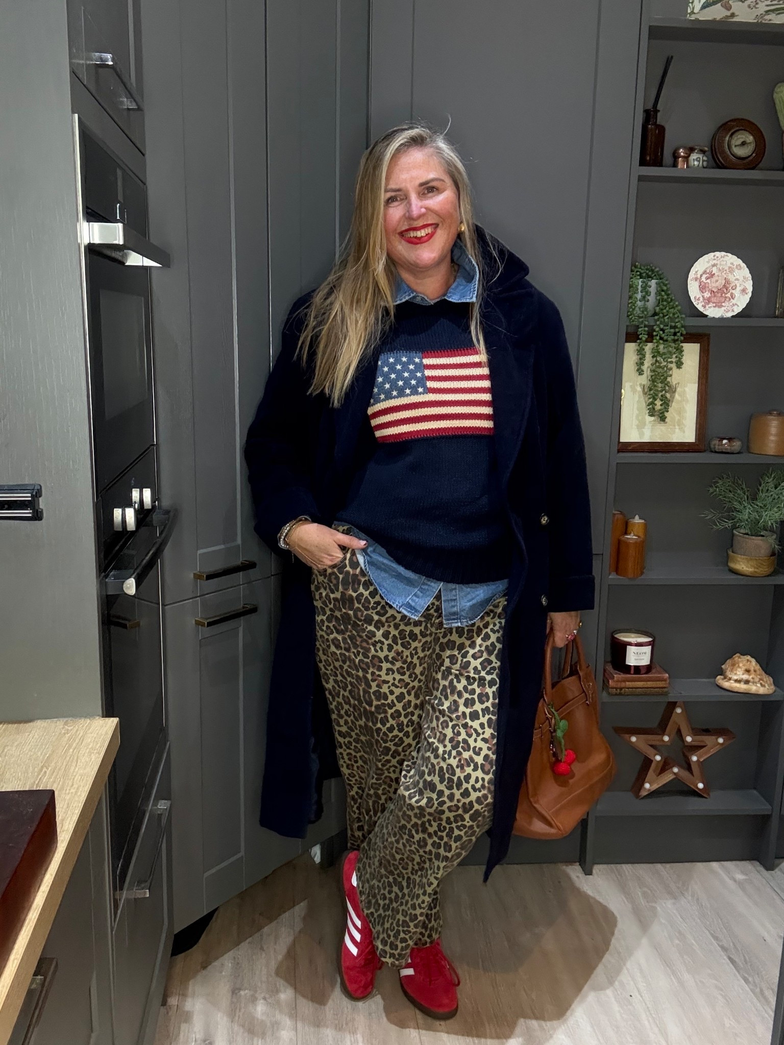 Leopard jeans, American flag jumper, denim shirt, red trainers, tan tote bag, navy overcoatt

#LTKjeans #LTKcurves #LTKplussize