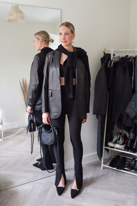 Black leather blazer and black split hem leggings outfit perfect for an evening outfit - dinner - drinks - date night 

Get 15% off my black handbag from ganni with my coggles discount code - CB15 - which gets you free next day delivery too!

#LTKeurope #LTKitbag #LTKshoecrush
