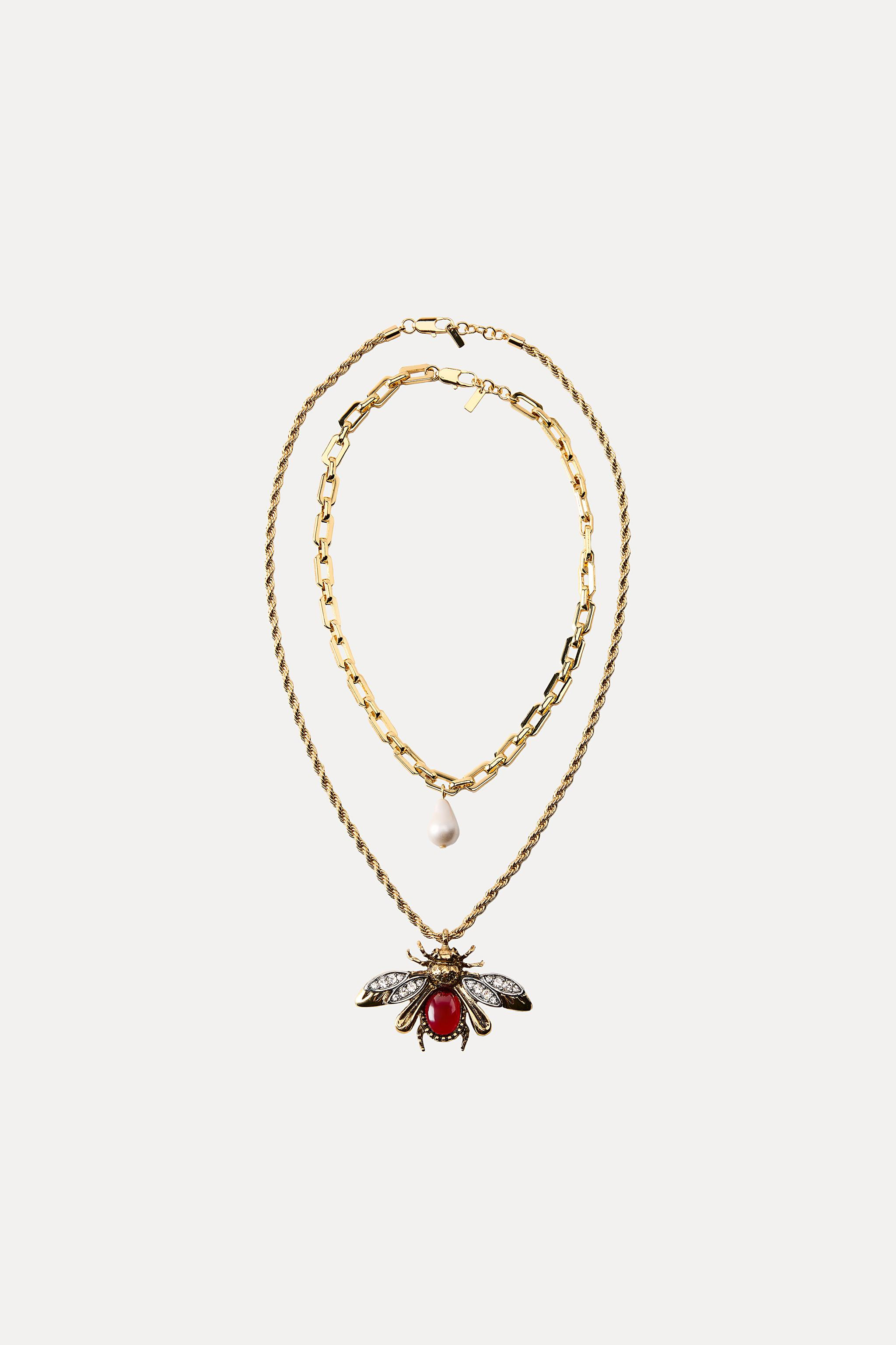 Pack of two necklaces:- Metal link necklace with pearl pendant appliqué. Lobster clasp closure.-... | Zara US