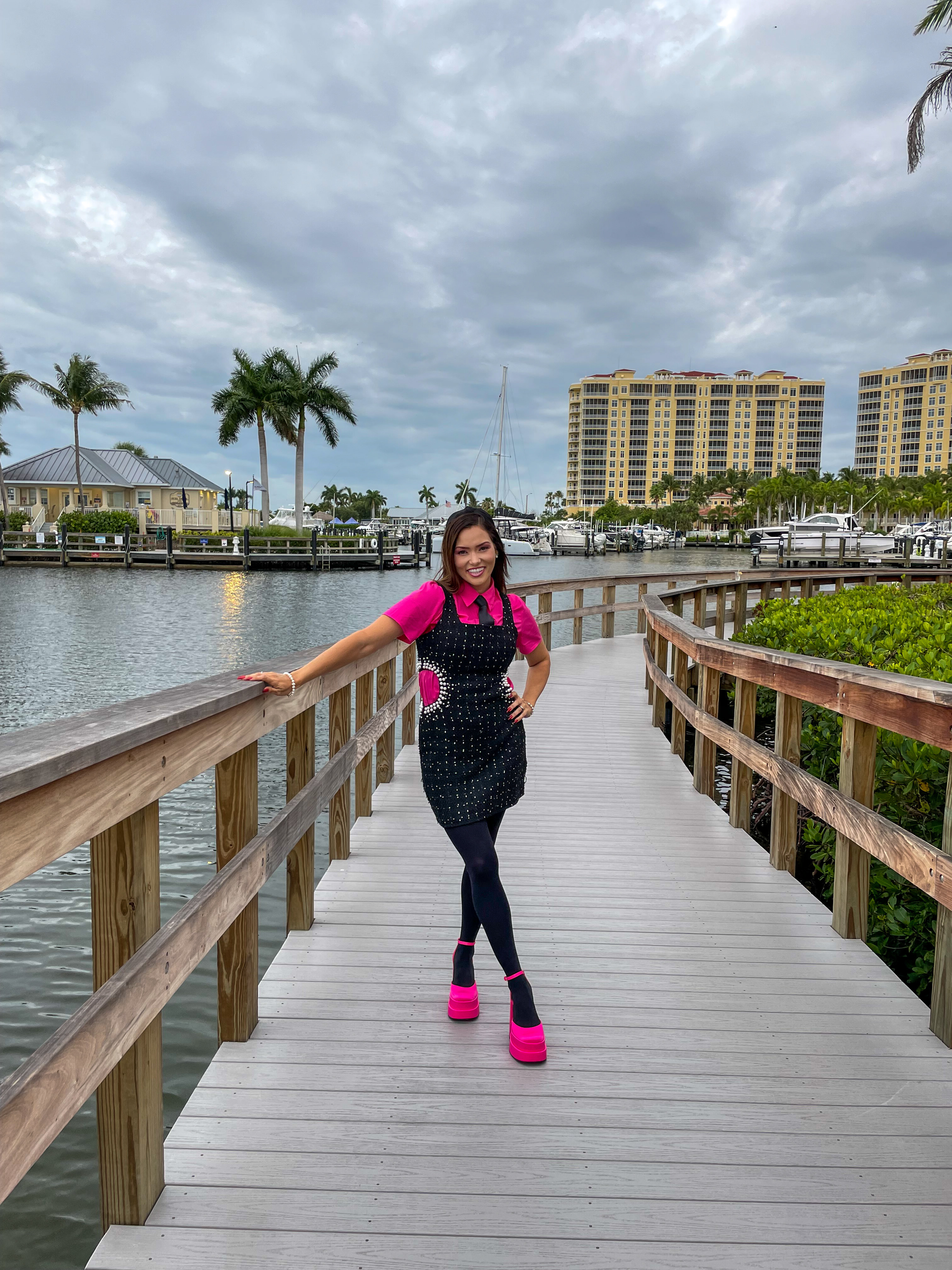 When you want your outfit to be classy but also trendy and you do it in hot pink and black and of course, add in some pearls to classy it up 

 