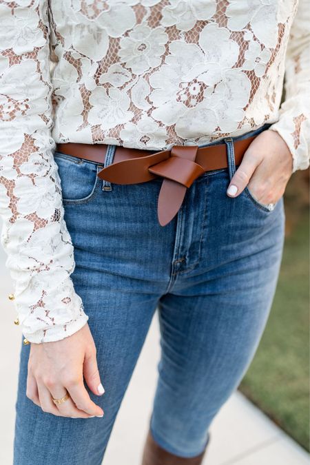 Add a leather knot belt with your denim jeans to elevate your look. These skinny jeans are one of the best I’ve tried. Super stretchy and comfortable! 

#LTKSeasonal #LTKstyletip