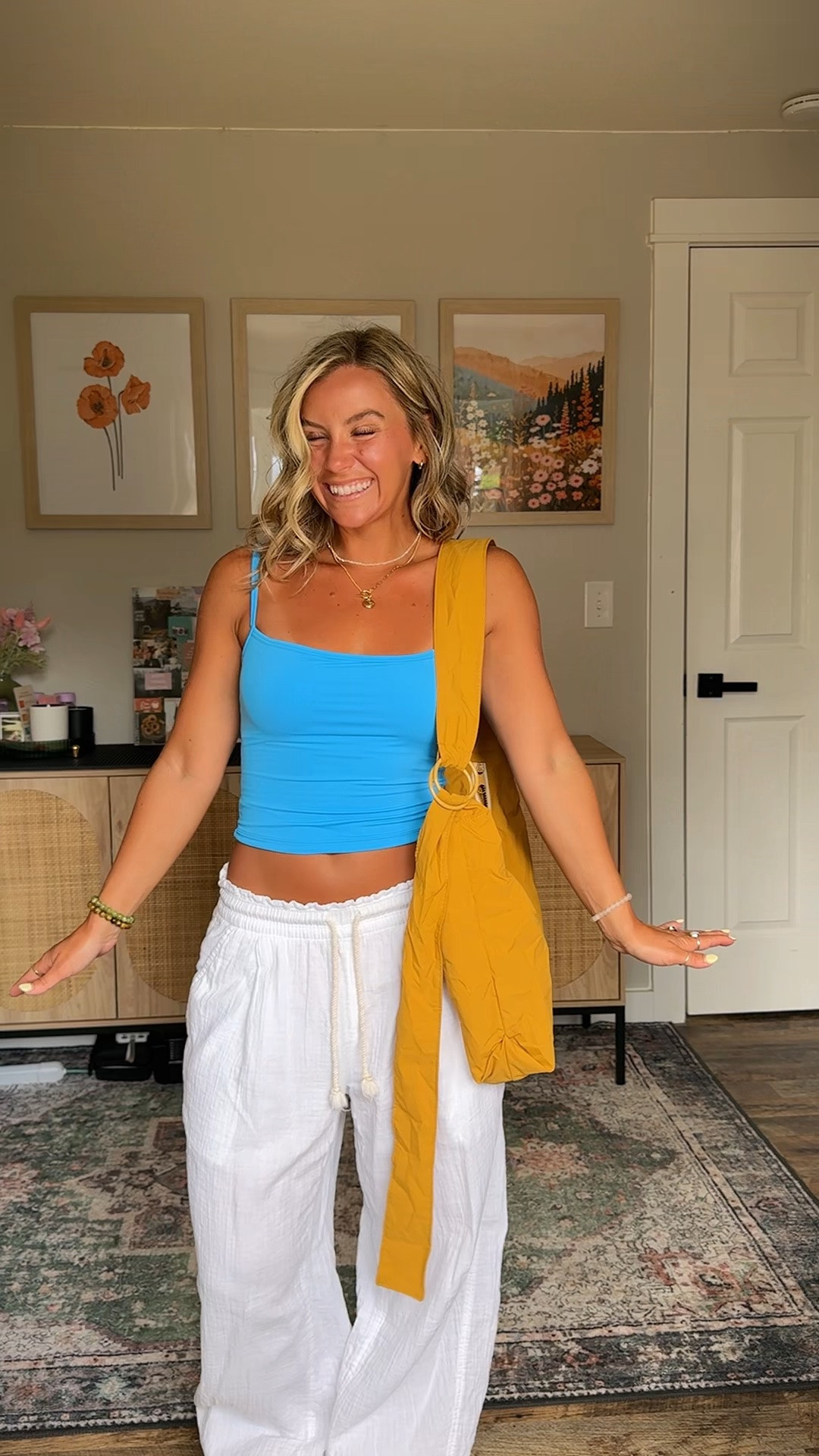 Simple cute & versatile travel slouchy bag!! This is the mini but you can fit so much stuff in it!  
Top: Small 
Bottoms: Small (petite)

#LTKTravel #LTKU #LTKootd