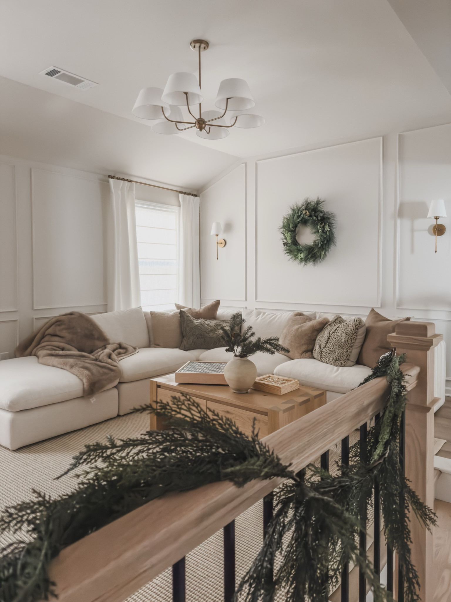 Cozy media room styling featuring creamy linens, faux fur accents, holiday greenery, and gold accents. Embroidered pillow covers add a touch of detail for a neutral winter style!

Home finds, media room, creamy linens, neutral home style, cozy vibes, Castlery furniture, Pottery Barn style, throw pillow, gold detail, linen curtain, lighting detail, coffee table detail, wreath faves, garland, faux fur blanket, wall sconces, game board detail, neutral area rug, Rugs USA, aesthetic home style, shop the look!

#LTKHome #LTKHoliday #LTKSeasonal