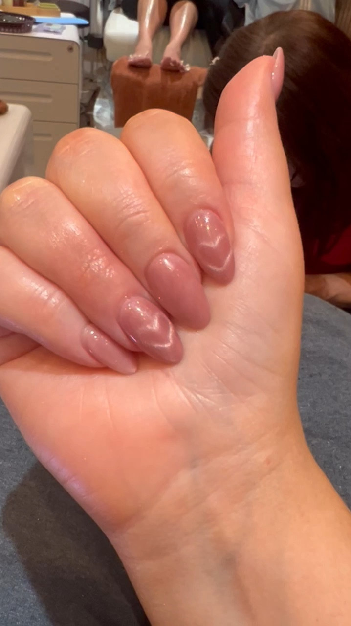 Valentine’s Day Manicure 💅🏼 

OBSESSED with these “invisible” hearts hidden with this cat-eye nail polish! 
Kim at island nail lounge is so freaking talented! She twisted metal wire into a v-shape then attached it to her magnet and hovered it above the cat-eye polish until the perfect heart formed. 

I love this color too. It’s super neutral and feminine and beautiful. The end of my video shows what my nails look like not in direct light - so it’s perfect for a subtle Valentine’s Day mani that you won’t feel like immediately needs painting over on 2/15! 

Absolutely in LOVE (pun intended 🥰)

#LTKSeasonal #LTKBeauty