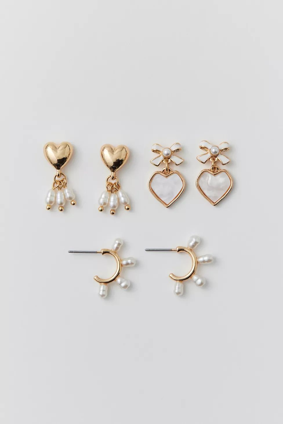 Pearl Bow Heart Delicate Earring Set | Urban Outfitters (US and RoW)
