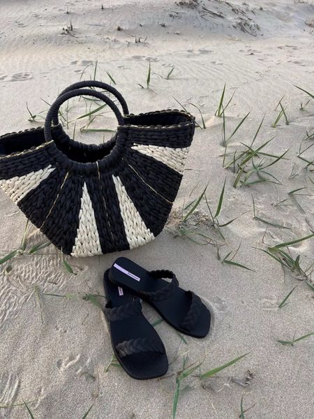 Perfect summer accessories! This purse is from a local boutique so I’ve linked a few similar ones I found on Amazon! Ipanema slides, black sandals, summer shoes, black and white woven purse, vacation accessories, summer accessories, purse, shoes

#LTKitbag #LTKswim #LTKstyletip