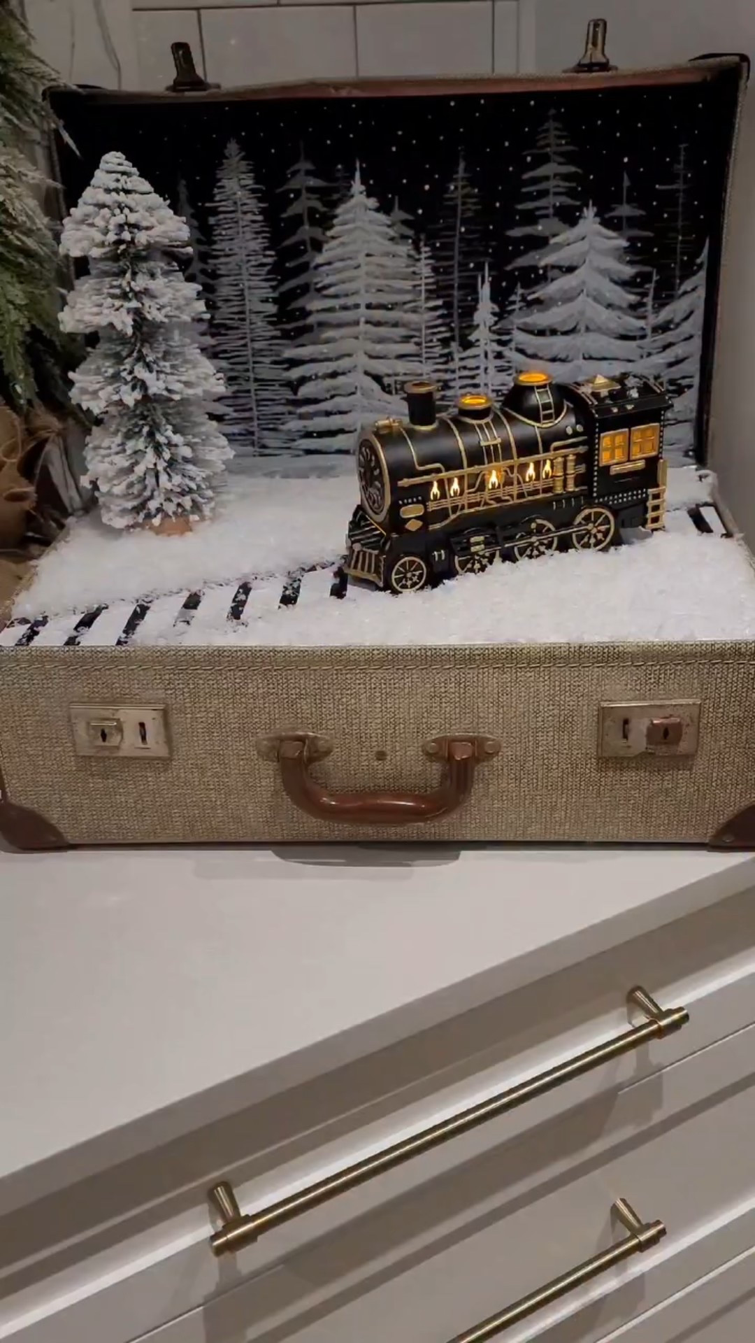 Do you remember at least a month ago when I showed you the train diffuser I got and said I had great plans for it? Well it took a little longer than expected but my version of the Polar Express has finally come to life! I also created the wintery scene backdrop in the vintage suitcase. It was very easy and I have all the details in my blog. 

Christmas decor diy / Christmas decorations / Polar Express train diy / Christmas train diy / Christmas train decor /

#LTKHoliday #LTKHome #LTKFindsUnder50