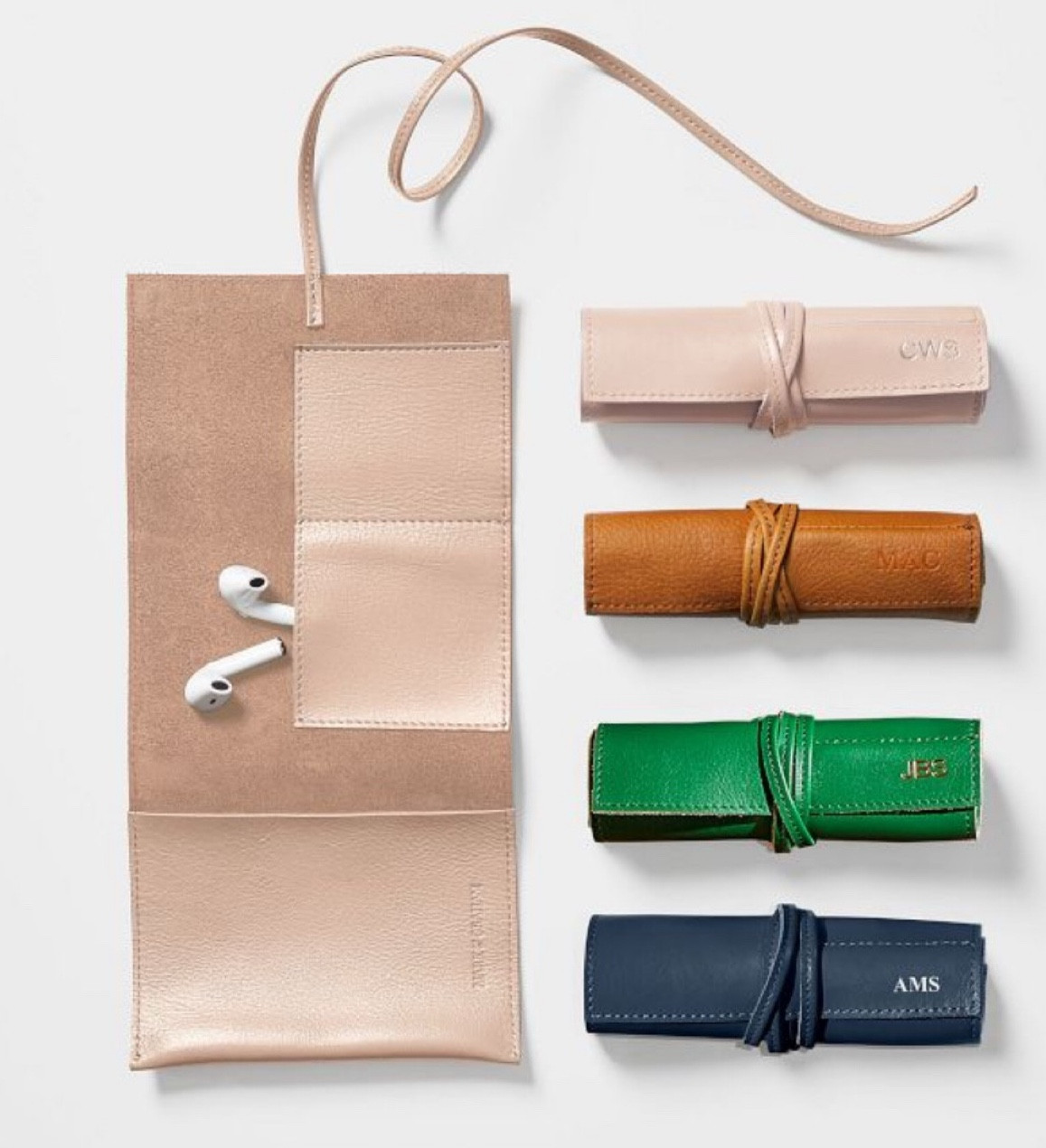 Leather charger roll ups. Great for travel and everyday organization! 

#markandgraham #travel #chargers #cords #organization

#LTKStyleTip #LTKFindsUnder50 #LTKTravel