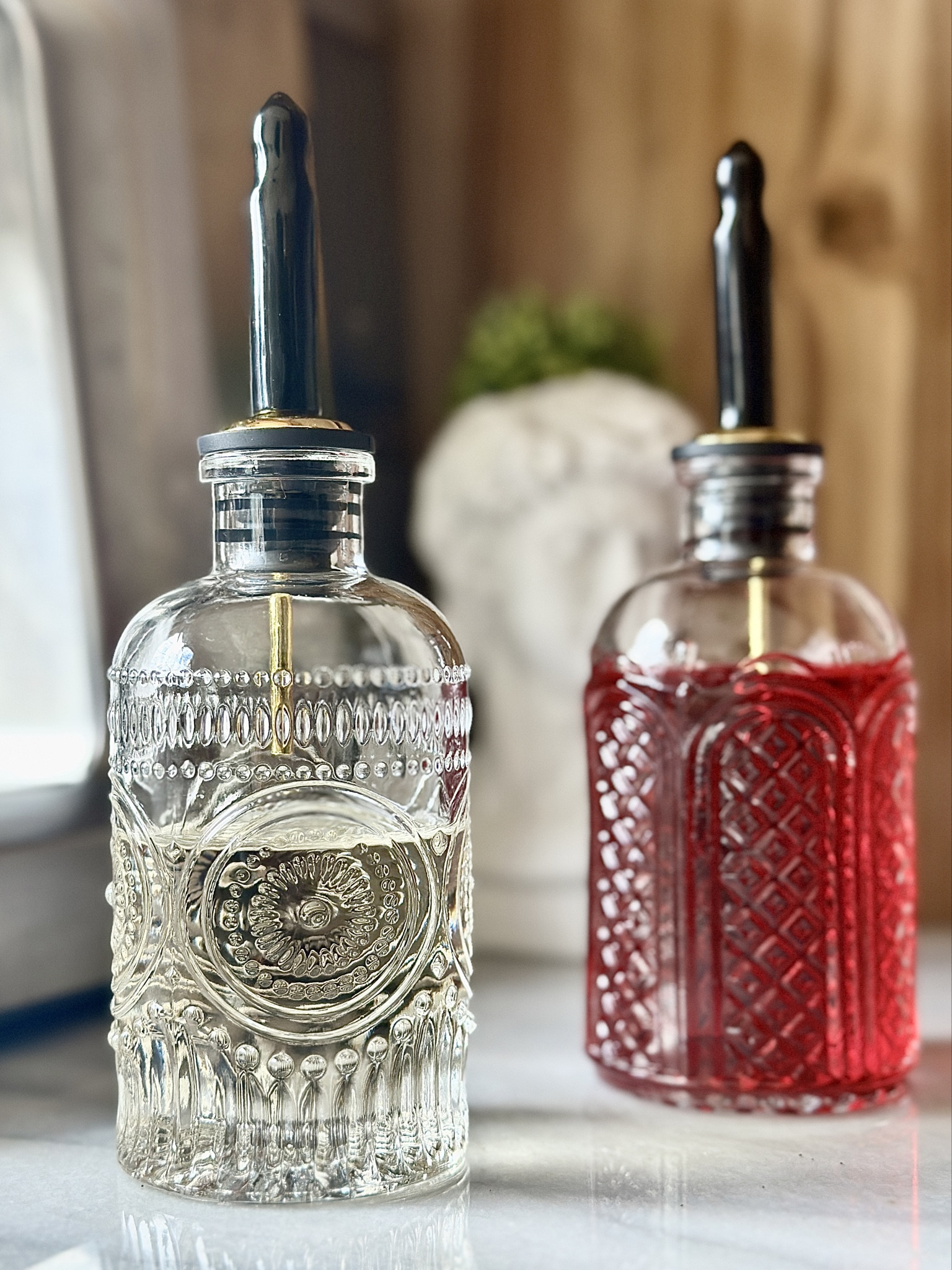 The prettiest vintage inspired syrup dispensers are the newest addition to the coffee station. 

These come in a set of four, each with a unique design on the glass. You can leave the gold spout exposed or cover. 

You could also use these for olive oil, balsamic vinegar and more! 

Coffee bar accessories // syrup dispenser // glass syrup bottle // condiment bottle glass // Amazon glassware // Amazon aesthetic finds // Amazon kitchen finds 

#LTKhome #LTKfindsunder50 #LTKfindsunder100