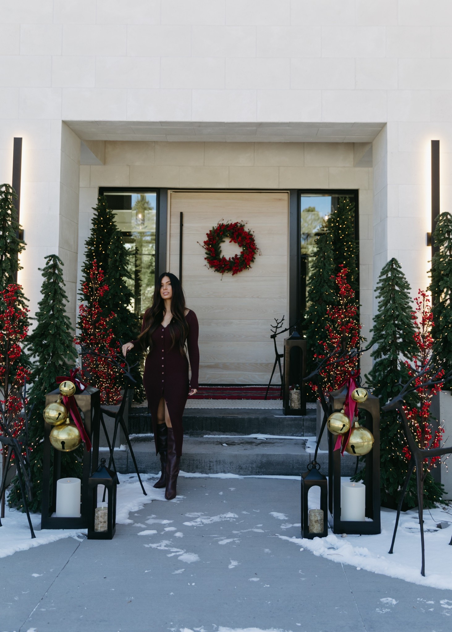 Decorating the front porch for Christmas is always so fun! The red was perfection. I used outdoor lanterns year-round. I spruced up these Caleb lanterns with the hanging bells to make them feel more like Christmas.

#LTKSeasonal #LTKHoliday #LTKHome