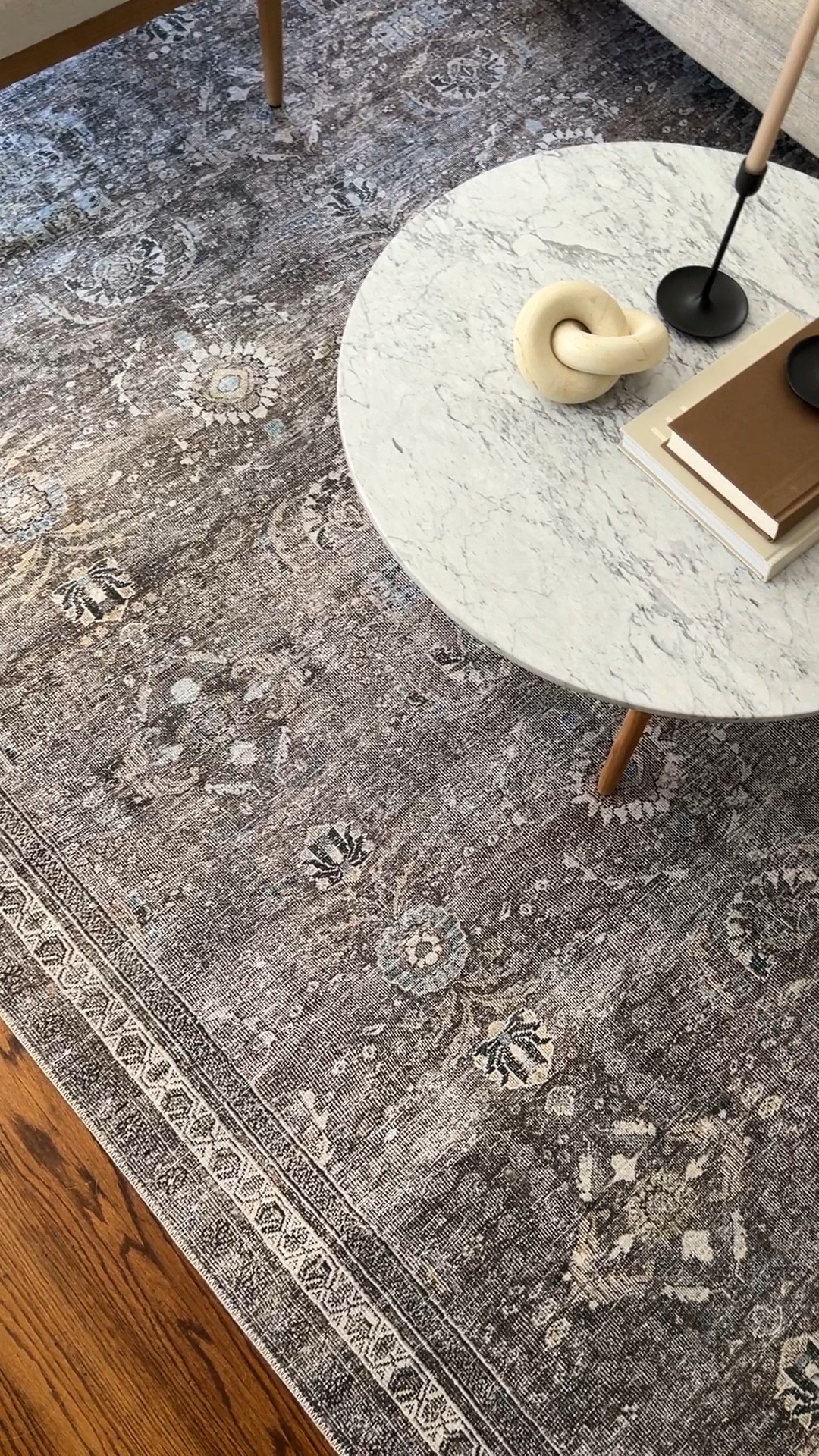 Loloi area rug, round marble coffee table

#LTKhome