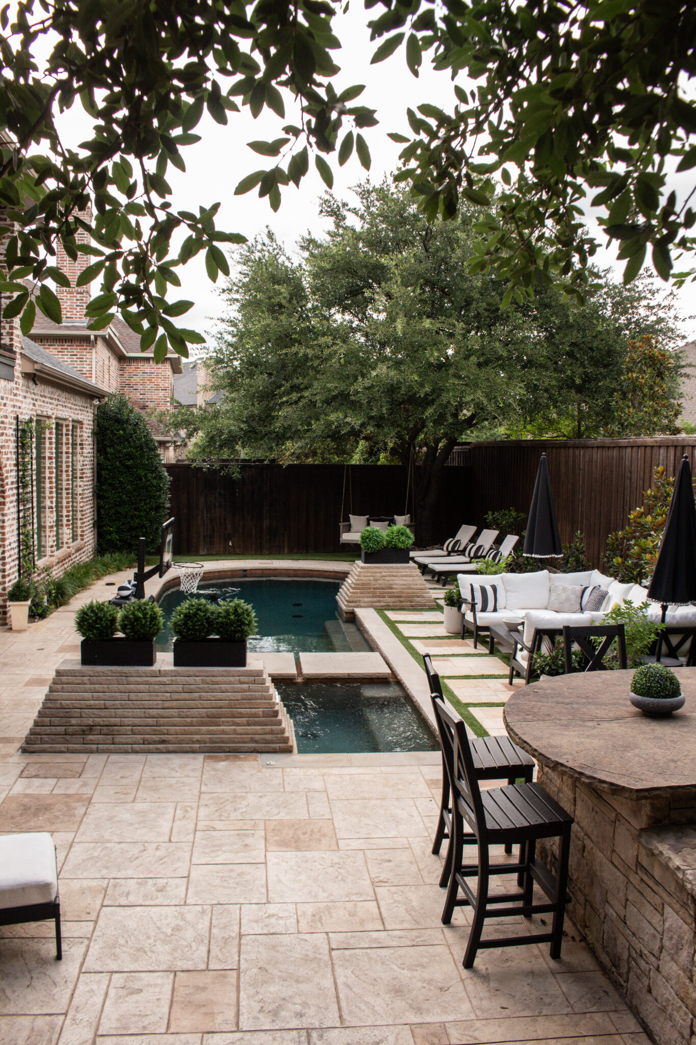 Save this if you're planning a backyard refresh! This gorgeous black and white outdoor design features timeless furniture, layered textures, cozy entertaining spaces, and classic decor you'll love for years to come.

#LTKSeasonal #LTKHome