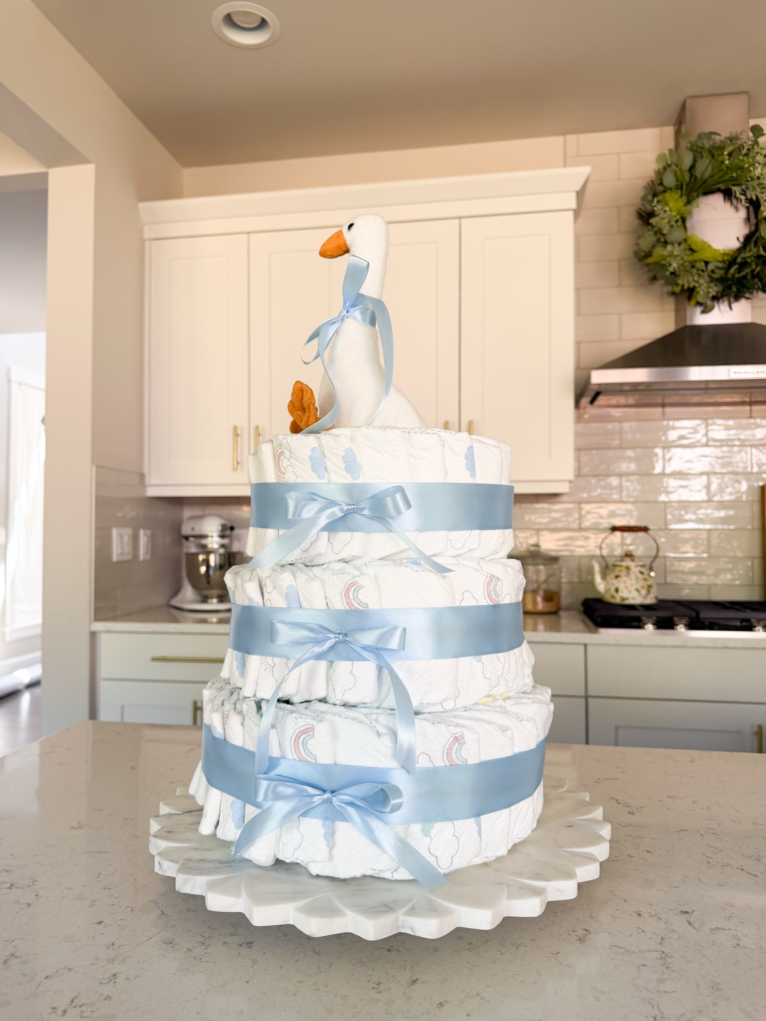 Silly goose themed diaper cake! 

Diaper, ribbon, rubber bands, round cake pan set, marble cake stand

#LTKhome #LTKmaternity #LTKbaby