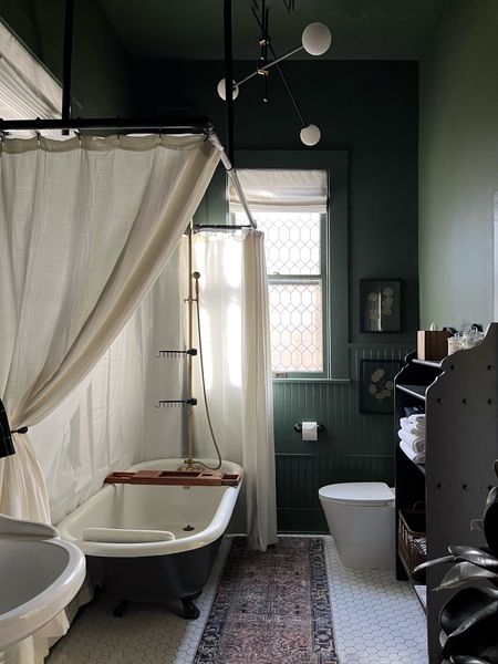 The green bathroom is a serene, romantic, and cozy little space for guests to relax. I love the mix of old and new in here 🖤

#LTKFind #LTKhome #LTKunder100