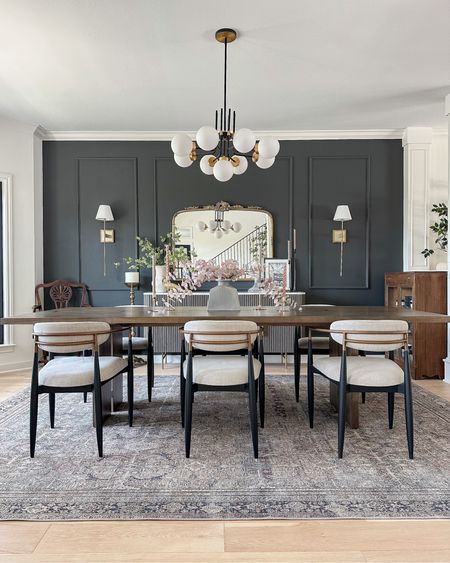 Our dining room rug is currently 70% off on Amazon! This is the 9’x12’ under a 108” table — always aim on the larger side when it comes to rugs to make your space feel larger! This is the Olive/Charcoal.

Arhaus jagger chairs, crate & barrel dining table, loloi Layla, designer dupe dining chairs, chandelier, buffet, sconces, decor

#LTKstyletip #LTKsalealert #LTKhome