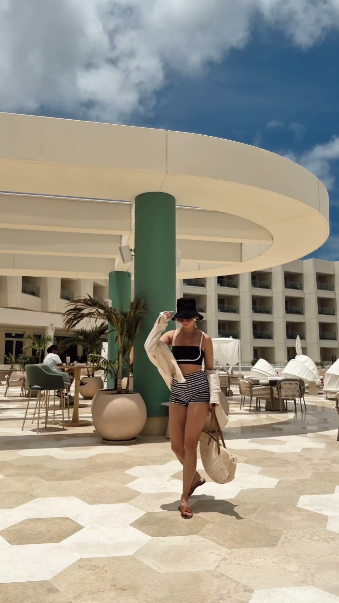 Aruba bound - pool outfit of the day. 

vacation outfit, resort wear, summer outfit, striped shorts, black and white bikini, beach cover up, summer shirt, aerie shirt, black hat, brown slides

#LTKWatchNow 

#LTKTravel #LTKStyleTip