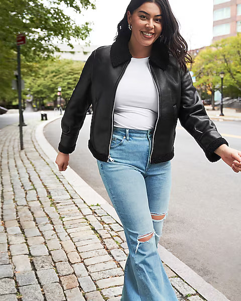 Conscious Edit High Waisted Light Wash Ripped Flare Jeans | Express