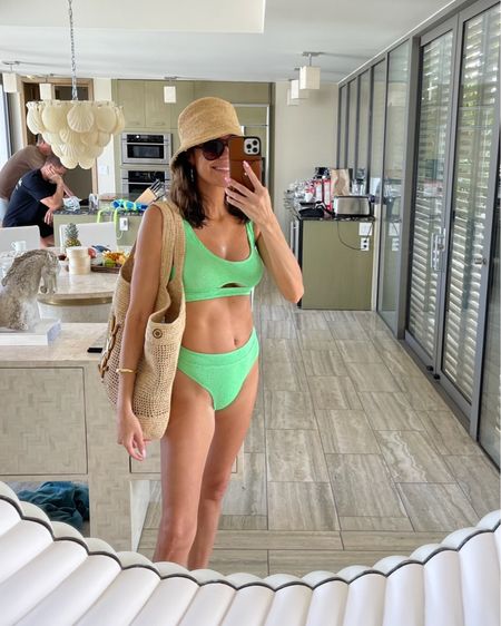 Loving bright colored swimsuits for the beach and pool this spring💚

Beach vacation outfit; resort wear; vacation outfits; Hunza g swimsuit; two piece swimsuit; bikini; green swimsuit; ysl beach bag; designer beach bag; bucket hat; Christine Andrew 

#LTKSeasonal #LTKswim #LTKtravel