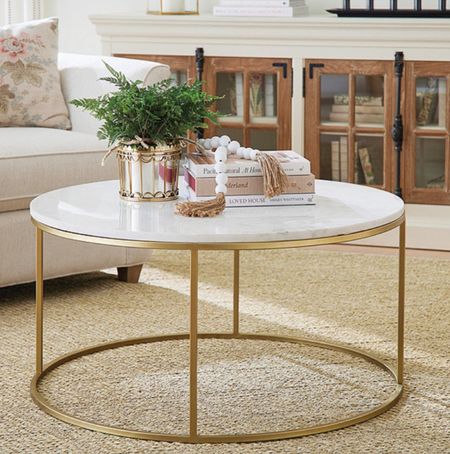 This beautiful marble and brass finish coffee table is on sale! It keeps the space so light and airy.


Traditional home, neutral home decor, armchair, end table, living room decor, framed art, accent pillow, lamp, wreath, curtains, accent rug, budget friendly home, mirror, Ballard, Ballard sale

#LTKhome #LTKsalealert #LTKfamily