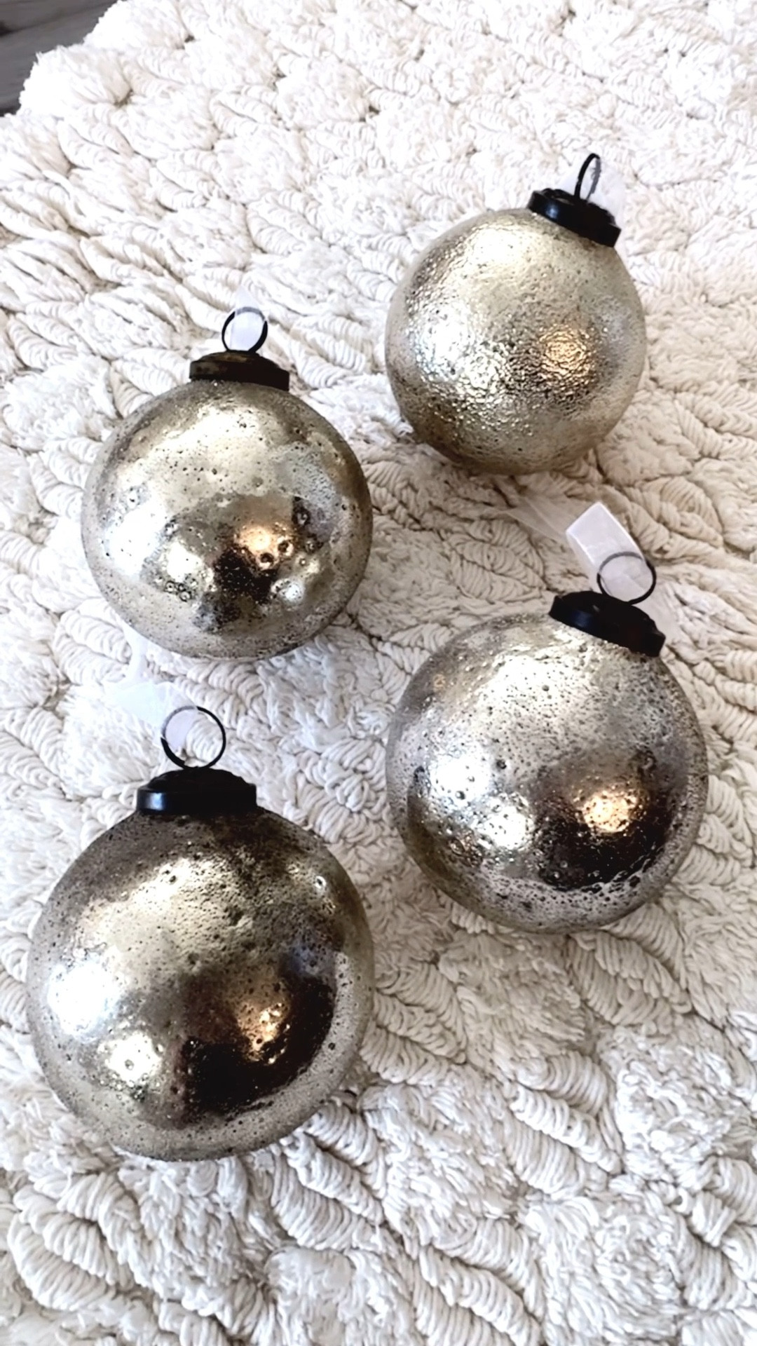 Bringing all the neutral modern holiday vibes to my home with these gorgeous hammered metallic ornaments! I love how their antique mercury finish catches the light and they look like metal. They shimmer just enough without being too flashy. The soft, weathered texture gives that perfect mix of cozy + elevated, and they look stunning paired with twinkle lights and neutral greenery. Totally obsessed with this timeless holiday vibe.

Decorating tip: mix metal tones and layer with glass or wood ornaments for a curated, high-end look that feels effortlessly festive.

Neutral Holiday Decor • Modern Christmas Style• Cozy Minimal Christmas • LTK Holiday Home • Neutral Christmas Decor • LTK Holiday Decor • Modern Holiday Vibes • Elegant Christmas Decor • Holiday Home Style • Neutral Christmas Aesthetic • LTK Seasonal Style • Holiday Home Vibes • Chic Christmas Decor • Modern Cozy Home • Holiday Aesthetic • Timeless Holiday Decor 

#LTKHoliday #LTKHome #LTKSeasonal