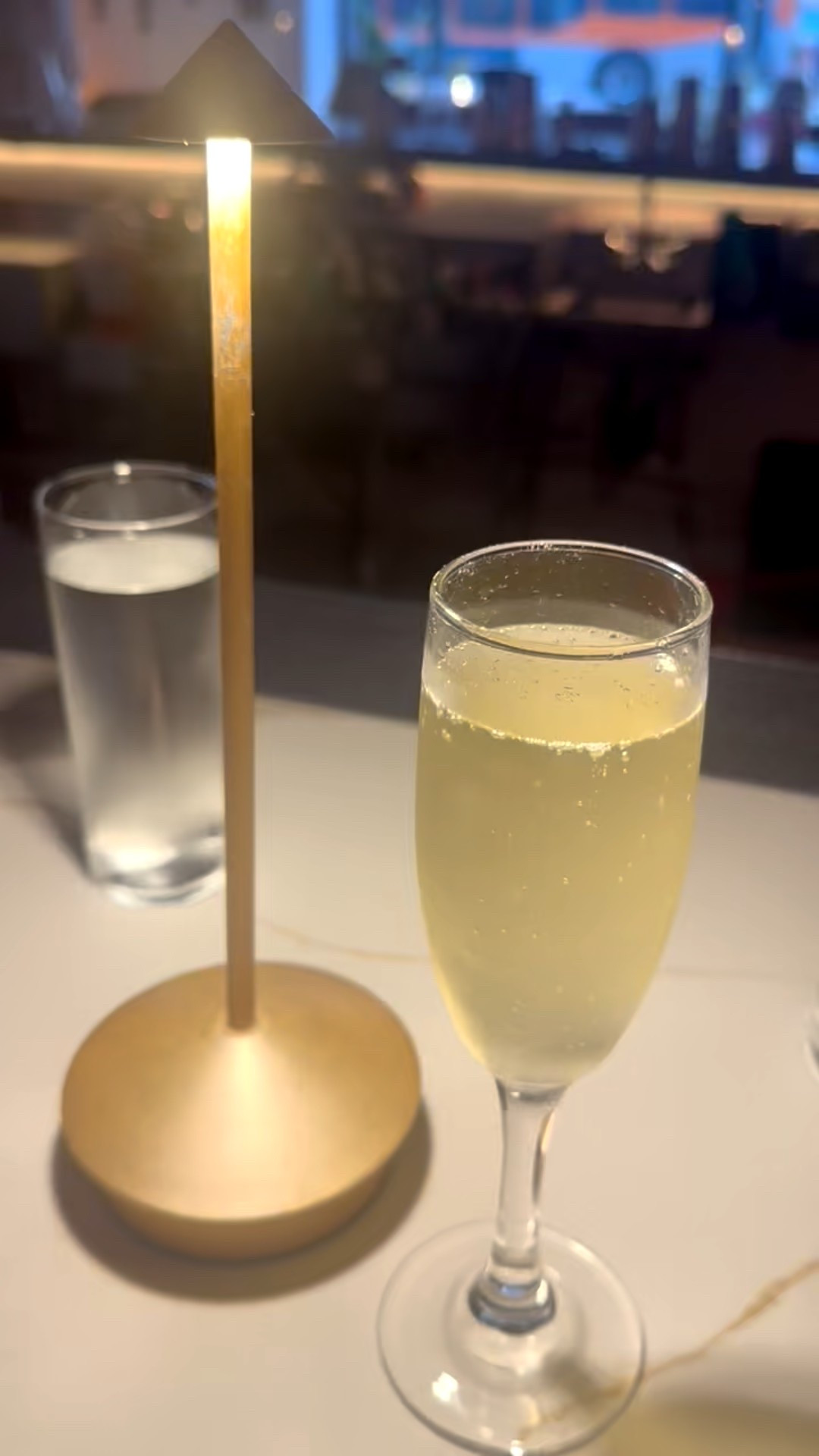 Unwind in style ✨ A glass of sparkling wine, chic barware, and the perfect glow from a cordless lamp.
#Barware #Drinkware #CordlessLamp #ElegantLiving #HomeBarVibes #CheersToStyle #RelaxInStyle

#LTKHome #LTKGiftGuide