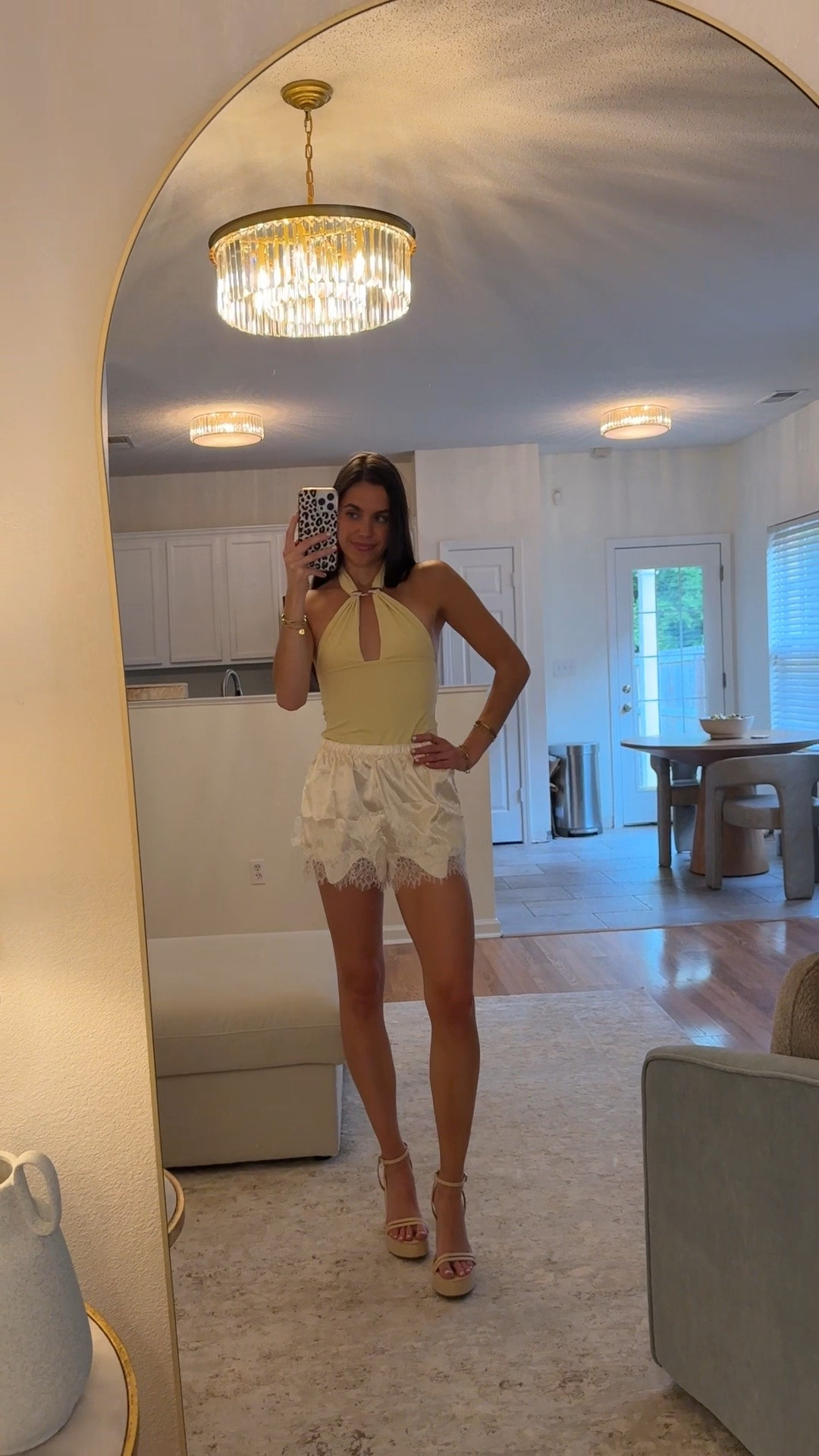 Soft + statement in one look. These lace-detail satin white shorts paired with a yellow halter top (with silver neckline detail) is the perfect mix of feminine and bold for summer. Linked below

#LTKgrwm #LTKootd #LTKSeasonal