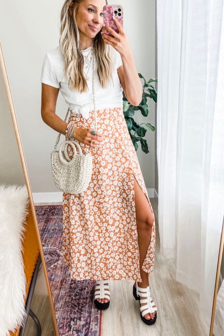 This boho floral skirt has been restocked in all sizes!!!! Perfect skirt for spring & summer 🤍

Size M in the skirt// I went up 1 size 

#LTKStyleTip #LTKWorkwear #LTKFindsUnder50